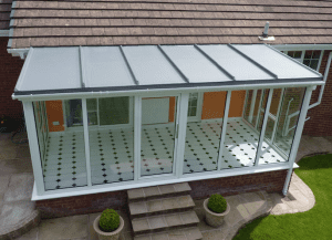 UPVC style orangery room with a new flat roof