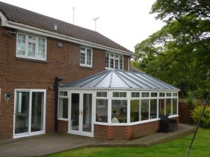 Orangery in a large garden with a new fibreglass roof